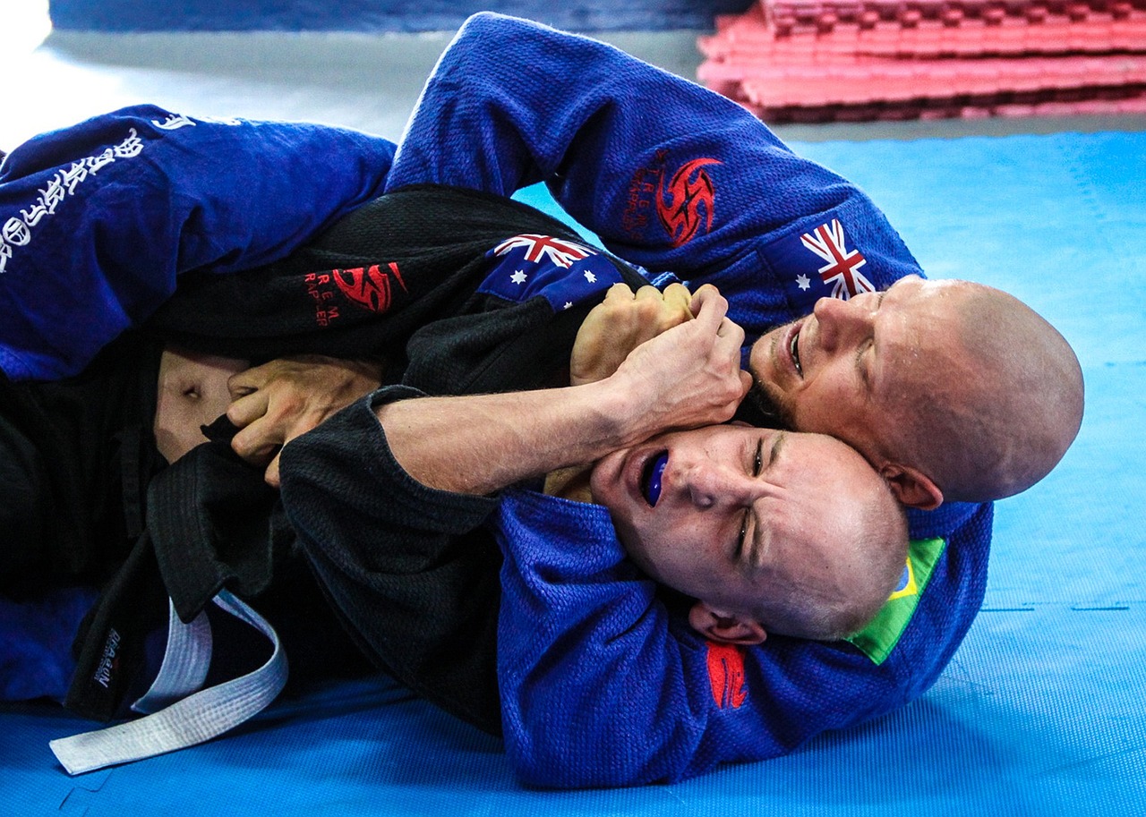 cbjj-header two BJJ Students rolling with each other